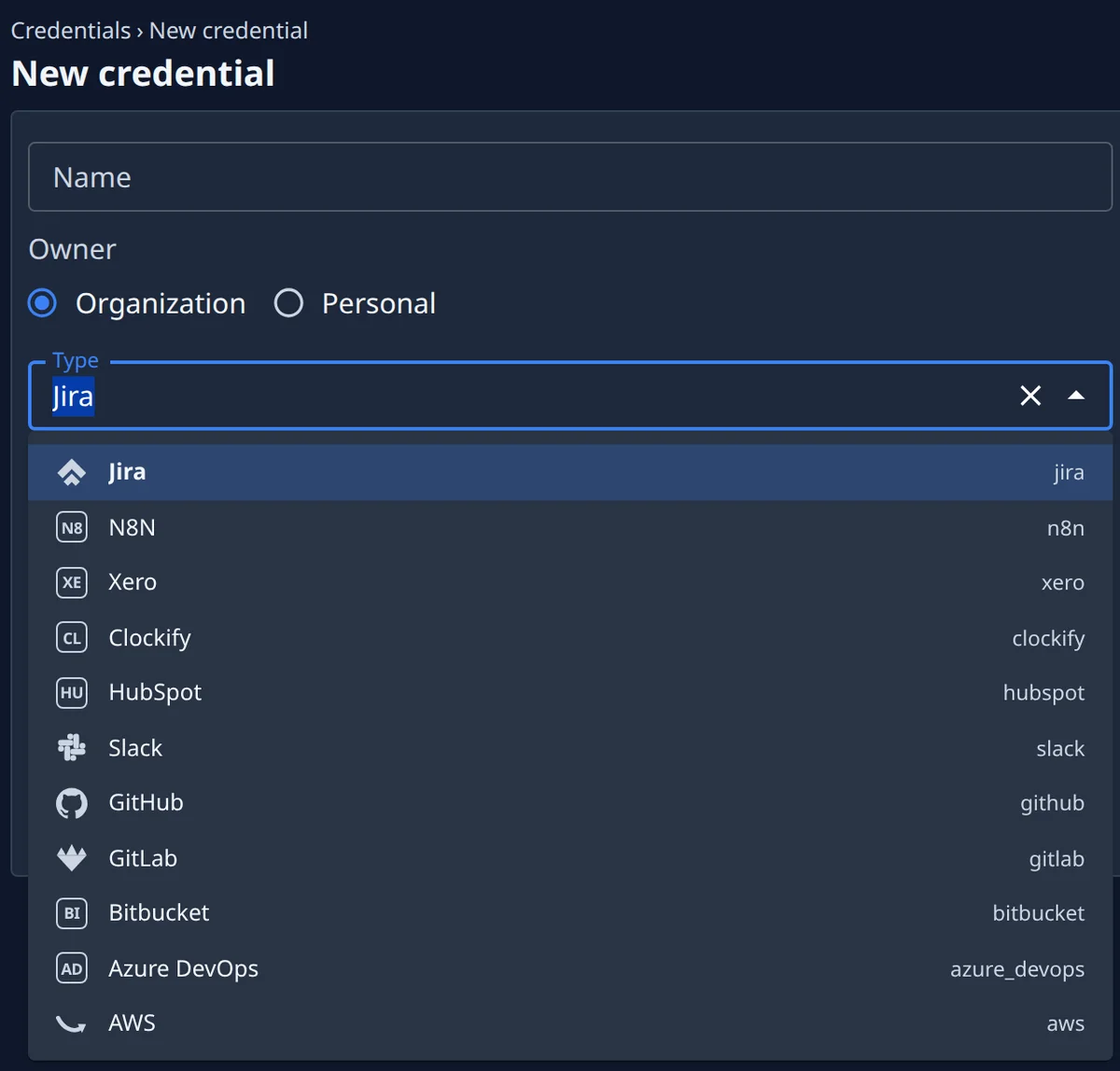 The New credential form, owned by the organisation or by one person, with its type list open: Jira, n8n, Xero, Clockify, HubSpot, Slack, GitHub, GitLab, Bitbucket, Azure DevOps and AWS.