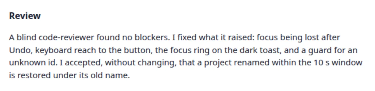 The review section of a finished task’s report: an independent reviewer read the change, each point it raised was fixed, and the one left as built says why.